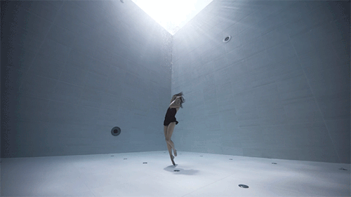 sixpenceee:Julie Gautier, French deep-sea diver, dancer, and filmmaker, performs an underwater dance