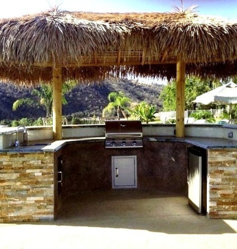 Tropical Patio - PatioExample Of A Large Island Style Backyard Stamped Concrete Patio Kitchen Design