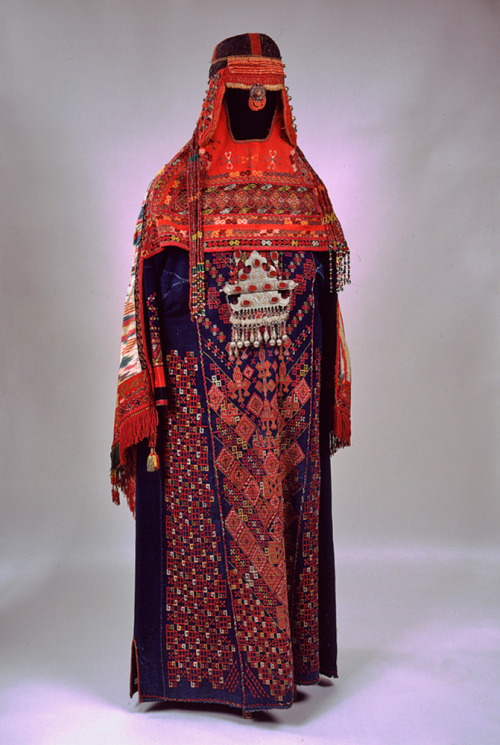 suzani:Women’s wedding traditional costume. Karakalpak, nomad’s culture. Ethnic silver jewellery, co