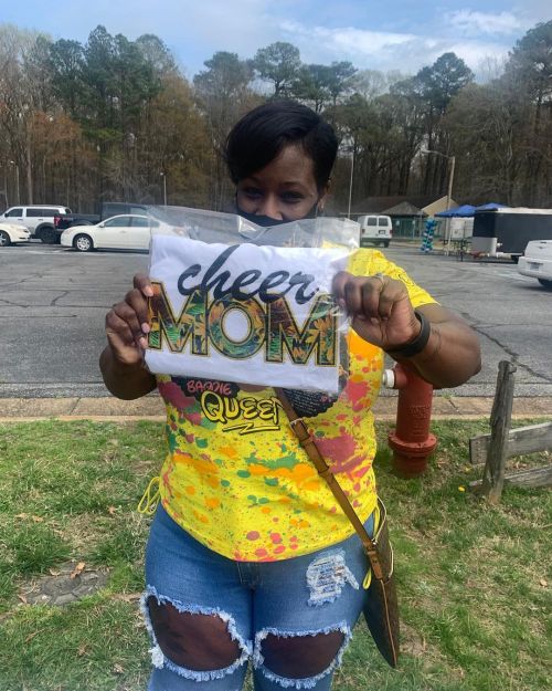 This cheer mom did not come to play! She entered SEVERAL tickets in the CCZ raffle and won a custom 