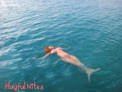 playful-nites:  A creative edit of me as a mermaid! I was actually floating in the water off pigeon key completely naked and loving it! #skinnydipping #floridakeys #hugeboobs #mermaid #outdoornudity