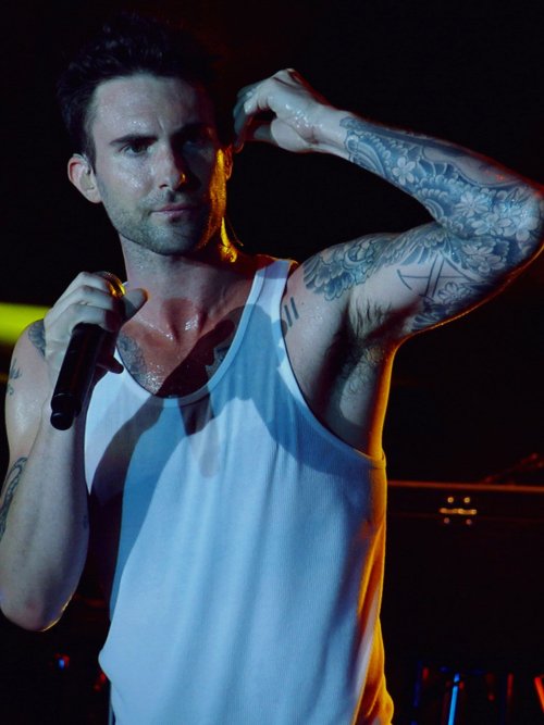 malearmpits:  I’m in a very Adam Levine mood right now, was sorting out my folder and this guy’s pits (sweaty and dry) are super whoah! *drools* and damn those tattoos! Argh! :D 
