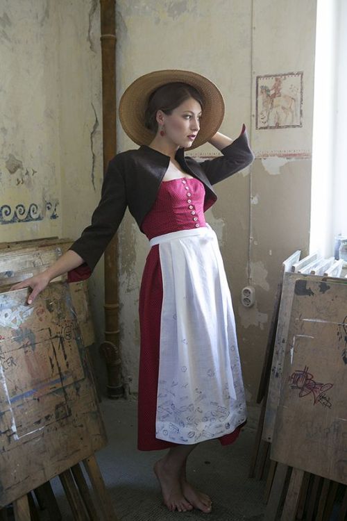 sartorialadventure: I have discovered the joy that is traditional Alpine dresses with hats.   A dirndl is the name of a traditional feminine dress worn in Austria, South Tyrol and Bavaria. It is based on the traditional clothing of Alps peasants.   