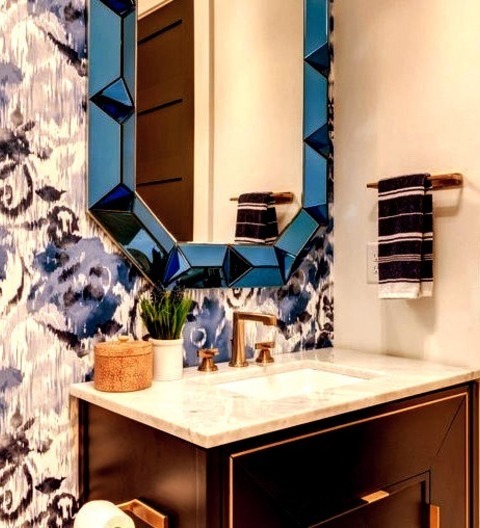 Powder Room AtlantaA Mid-sized Transitional Powder Room Design Example With A Light Wood Floor, White