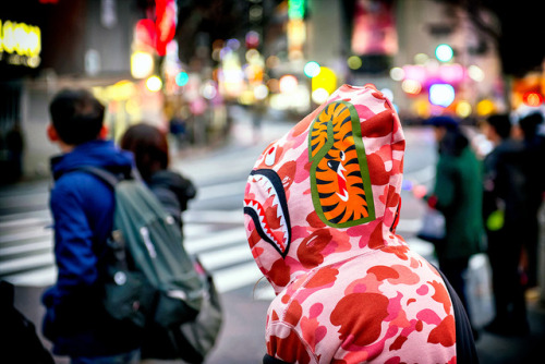 BAPE pink camo shark hoodie spotted at Shibuya Scramble in Tokyo.