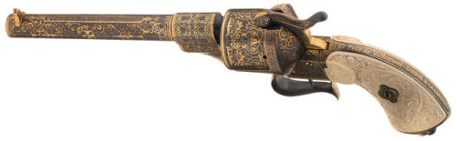 Gold damascened Spanish pinfire revolver with carved ivory grips, crafted by Placido Zuloaga. Inscri