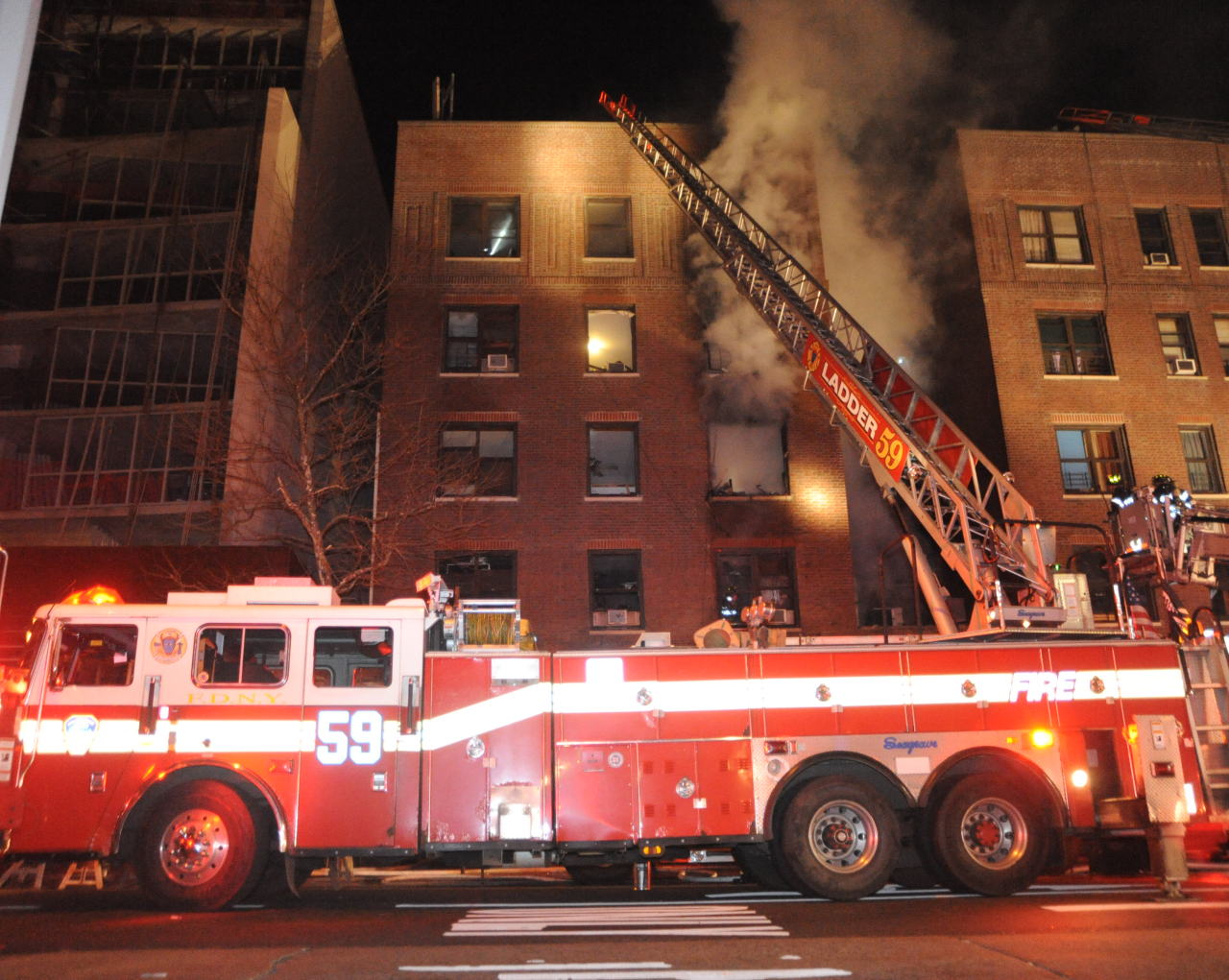 FDNY Ladder 59 responding to a fire responding to a fire in Manhattan, 2013.