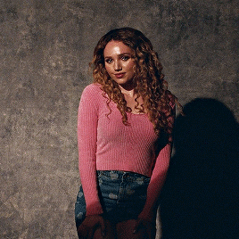 [Caption: 9 gifs from Euphoria. One large gif of Lexi getting her picture taken at the play at the t