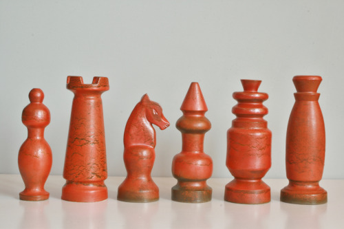 puppymush:designobjectory:Red and blue ceramic pieces from a chess set made by Nico Bongers during a