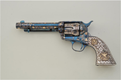 Ornate Colt Model 1873 Single Action Army with cast silver Mexican style grips.Sold at Auction: $5,0