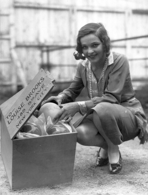 whataboutbobbed: Sally Blane packs up some autographed ostrich eggs for Louise Brooks, Easter 1