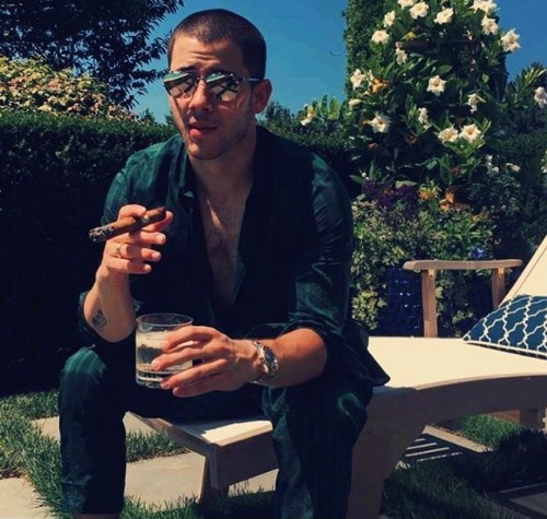 celebritysmokingcigar: Nick Jonas