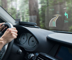 awesomeshityoucanbuy:  Dashboard Heads Up DisplayExperience the future of driving with the revolutionary dashboard heads up display. Featuring touchless gesture commands, it integrates with your smartphone to project messages onto the windshield so you