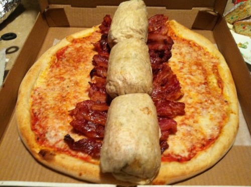 foodhumor:  Meet the burrito-filled bacon pizza burrito. Yes, that’s right: Some gluttonous/stoned genius managed to wrap two pounds of bacon and three chipotle burritos within a large cheese pizza. The pizza burrito then is topped with more cheese