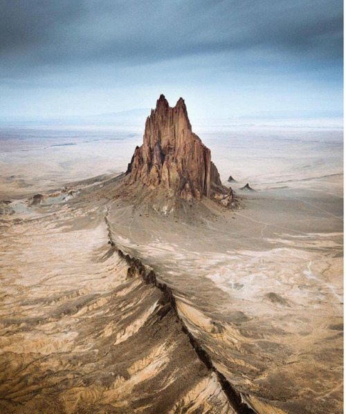 Shiprock rising nearly 1,583 feet above the high-desert plain of the Navajo Nation in San Juan Count