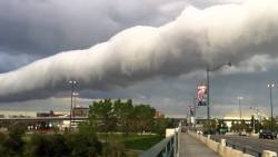 sixpenceee:  Roll clouds are a type of arcus clouds are typically associated with thunderstorms. These rarities of nature occur when air temperatures invert and cause the warm air to be on top of the cool air. Wind then changes speed and direction and