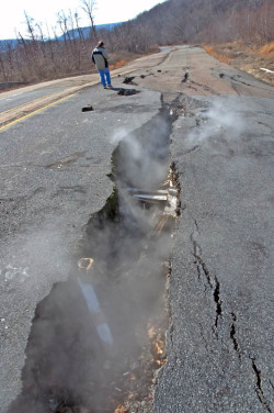 inescapable-wanderlust-deactiva:  Visit Centralia, Pennsylvania. Centralia was once a booming mining town, but after a mine fire broke out beneath the town in 1962, the population dwindled to 10 residents as of 2010. The fire still burns to this day.