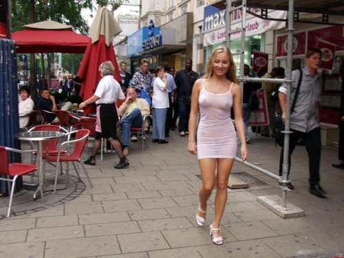 carelessinpublic:In her transparent dress outside a restaurant and showing her boobs and pussy
