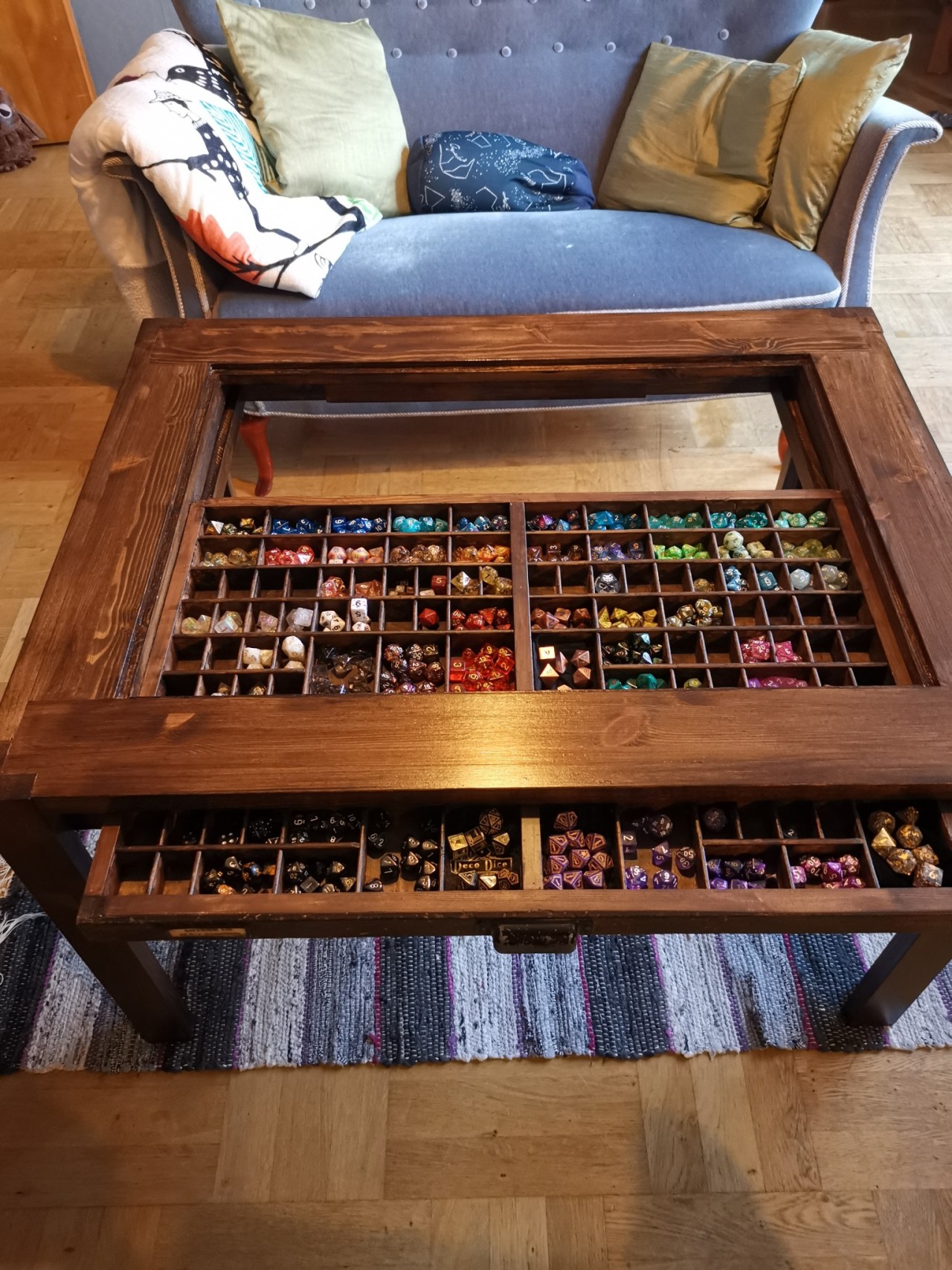 dicecleric:Behold my new custom made coffee table with place for my collection!