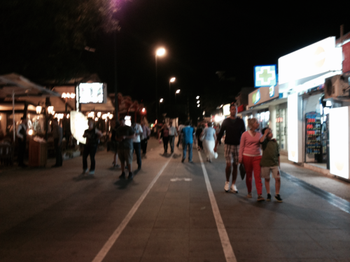 People walking on the promenade in Mamaia.