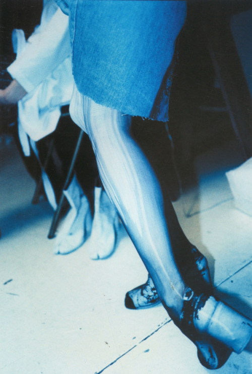 witchesandslippersandhoods:  Maison Martin Margiela A/W 1996  The women’s legs were painted white and tights were pulled over their shoes