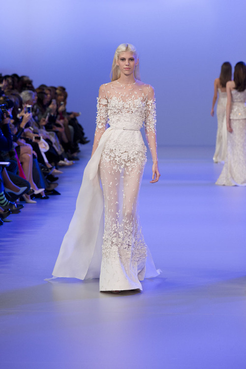 eliesaab:  Opening pure white gowns from yesterday’s Haute Couture show.  View the entire collection on www.live.eliesaab.com 