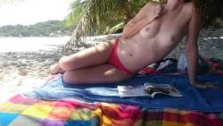 couplebourgeoispariscuckold:My wife teasing me on a Seychelles sand beach. Other family guys were watching discretly