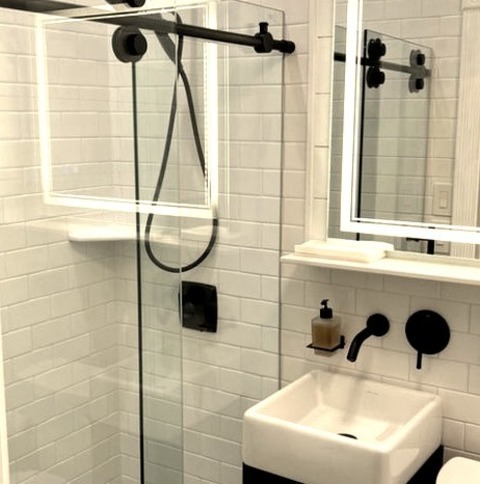 3/4 Bath BathroomAn Illustration Of A Small Transitional Bathroom Design Features A Shiplap Wall, A Single