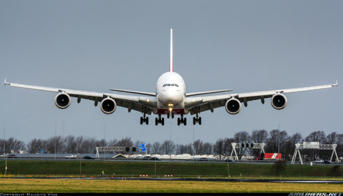  EK147 fighting some Dutch crosswind during final approach.Emirates -  Airbus A380-861b in Amsterd