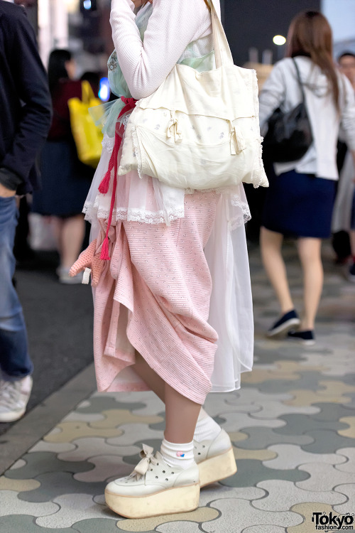 18-year-old Hikari on the street in Harajuku wearing a pastel cult party kei-inspired look featuring