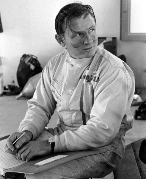 Bruce McLaren takes endearing muckiness to a new level. Bonus points for the hair escaping from its 