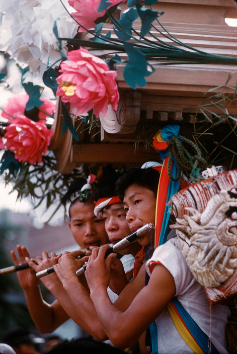 20aliens:  Japan. 1991. Near Mt. Fuji.Japan. Himeji. 1961. Young flute players during Quarrel Festival procession.Burt Glinn