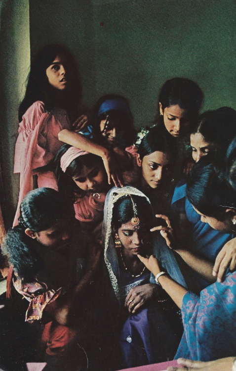 vintagenatgeographic:  Bangladeshi women gently prepare a bride for her wedding National Geographic 