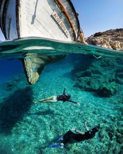 Under the boat / Karpathos Island, Greece / Travis Burke Photography