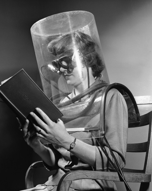 vintageeveryday:Betty Cook, a lab assistant at the Stanford Research Institute, is shown taking a &l