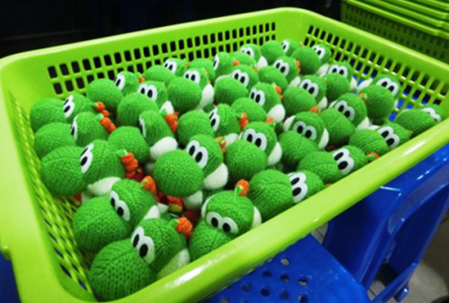 Photo of the manufacturing process of the Yarn Yoshi amiibo, published in 2021 on Nintendo of Japan’