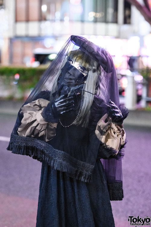 Japanese shironuri artist Minori on the street in Harajuku wearing handmade, remake, and vintage fas