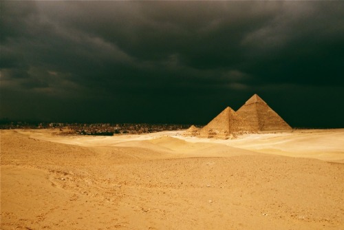 thoughtsforbees: A storm brews over the Pyramids of Giza. Egypt