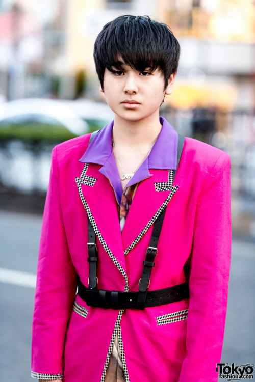 16-year-old Japanese student Taira on the street in Harajuku wearing a black harness over a vintage 