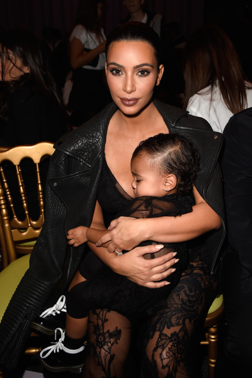 kimkanyekimye:  Kim &amp; North at the Givenchy SS15 show in Paris 9/28/14  perfect