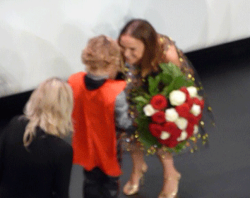 tallythor:  a-tongue-is-like-a-sharp-knife:   As Chris couldn’t make it tonight, he prepared you, Natalie, a little surprise.  “Thor : The Dark World” premiere in Paris on Oct 23rd 2013 (taken by me)  Which begs the question, who is that