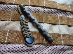 ru-titley-knives:  Custom made tactical pen .  I made it from an offcut of 10mm Sculpted green canvas micarta with a paracord lanyard made by my good friend Andrew over at valleydeepmountainhigh  with infilled GITD eyes .