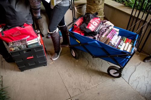 #ThrowbackThursday to one of our fav things: when people bring suitcases and wagons full of books to