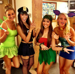 halloweenisforthesexy:  Can’t decide whether the cop or the hula girl is my favorite.