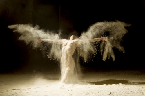 adventuresinhires:  Poussière d’étoiles (Stardust) is a series produced by the French photographer Ludovic Florent. It showcases dancers brimming with adding flour. Sand grains accentuate the majestic movement choreography. 