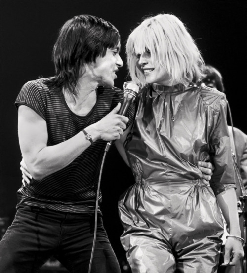 debbieharry1979:  iggy pop with debbie harry of blondie on stage in 1980