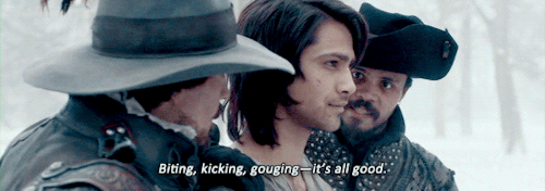 musketeergifs:two proud dads teaching their son how to stay alive