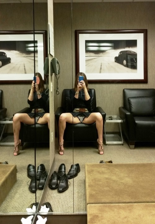 in the men’s changing room waiting area…while my husband and other guys are trying things on!  so fun ;)