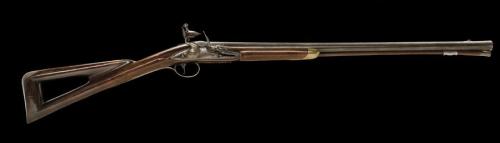 English flintlock coach gun crafted by Benjamin Griffin of London, circa 1765.