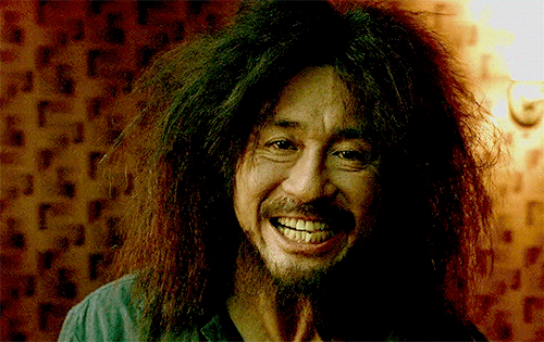 hajungwoos:    Laugh and the world laughs with you. Weep and you weep alone.   Oldboy (2003) dir. Park Chan-Wook 
